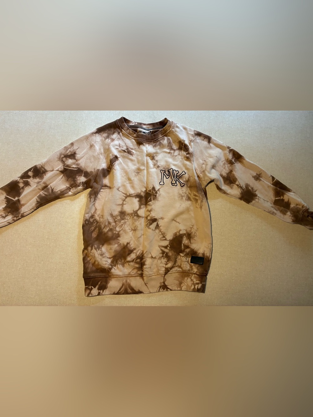 Munstr Vintage-Style Brown tie dye Graphic sweatshirt with thumb holes.